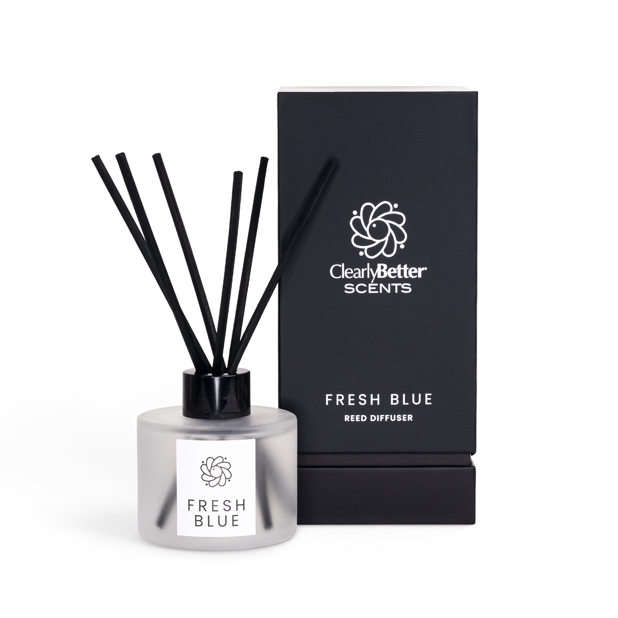 Reed diffuser with black sticks and clear base labeled 'Fresh Blue' by Clearly Better Scents, next to a matching black box on a white background.